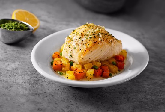 Ruth's Chris Steakhouse signature dishes Chilean Sea BassFilet and ShrimpNew York Strip